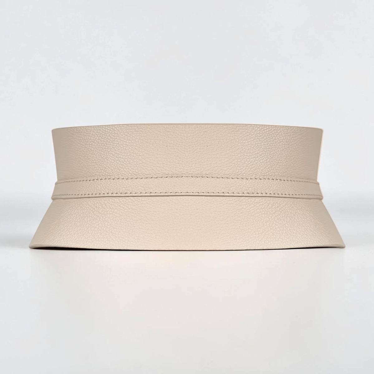 Aria Margo slim beige Italian leather corset belt with a structured, textured finish for waist definition.