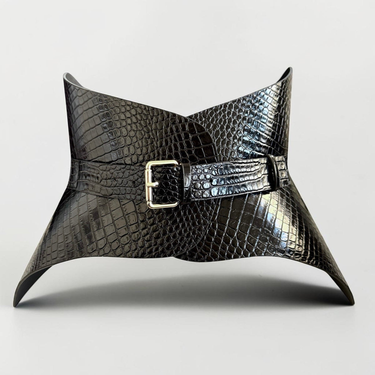 Aria Margo black croc-embossed Italian leather corset belt with a single buckle for a feminine silhouette.