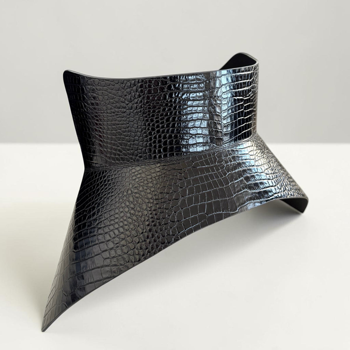 Aria Margo black croc-embossed leather corset belt with a structured 26 cm shape and single buckle detail.