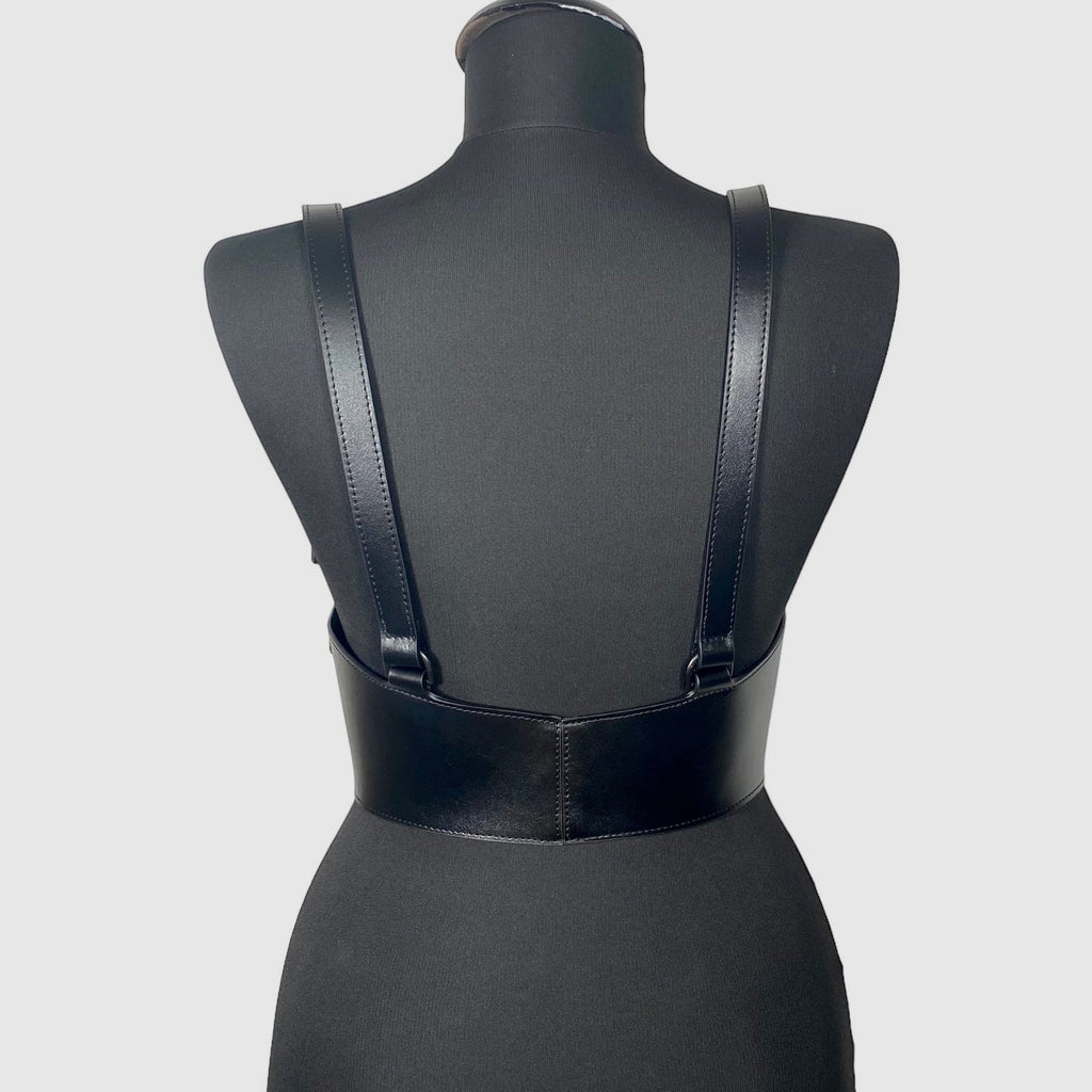 Aria Margo black Italian leather under-bust corset with adjustable shoulder straps on a mannequin, back view.