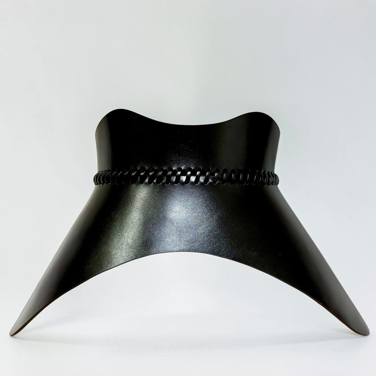 Aria Margo black Italian leather corset belt with a sculpted hourglass shape and hand-worked lacing detail.
