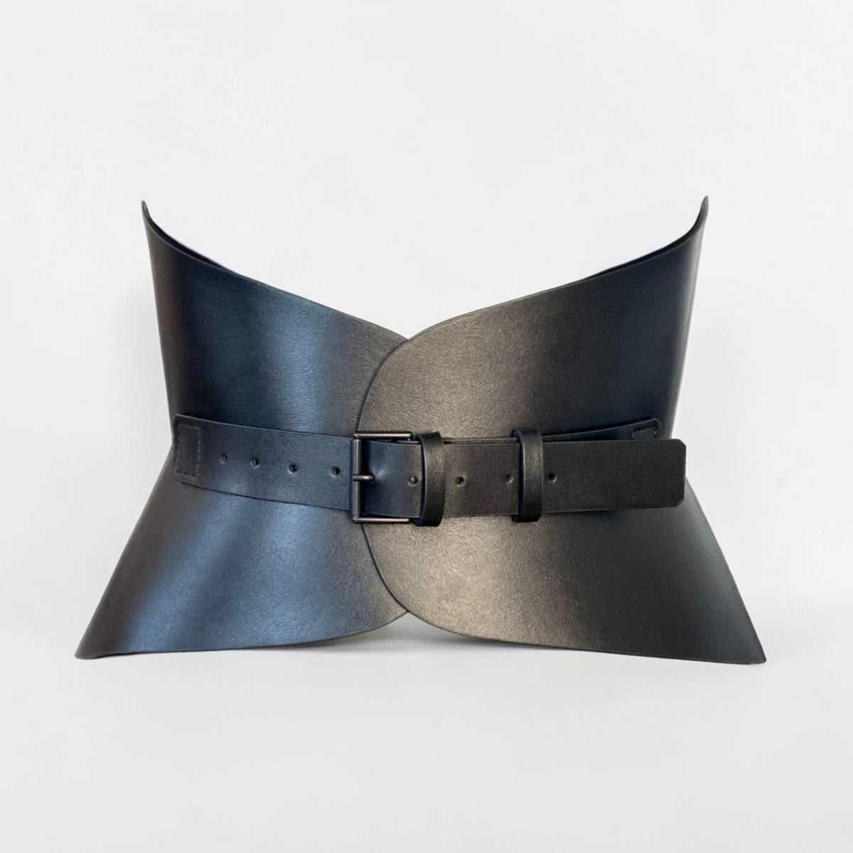 Aria Margo black Italian leather corset belt with a sleek buckle, styled on a mannequin for waist definition.