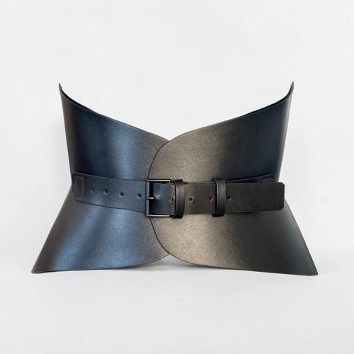 Aria Margo black Italian leather corset belt with a sleek buckle, styled on a mannequin for waist definition.