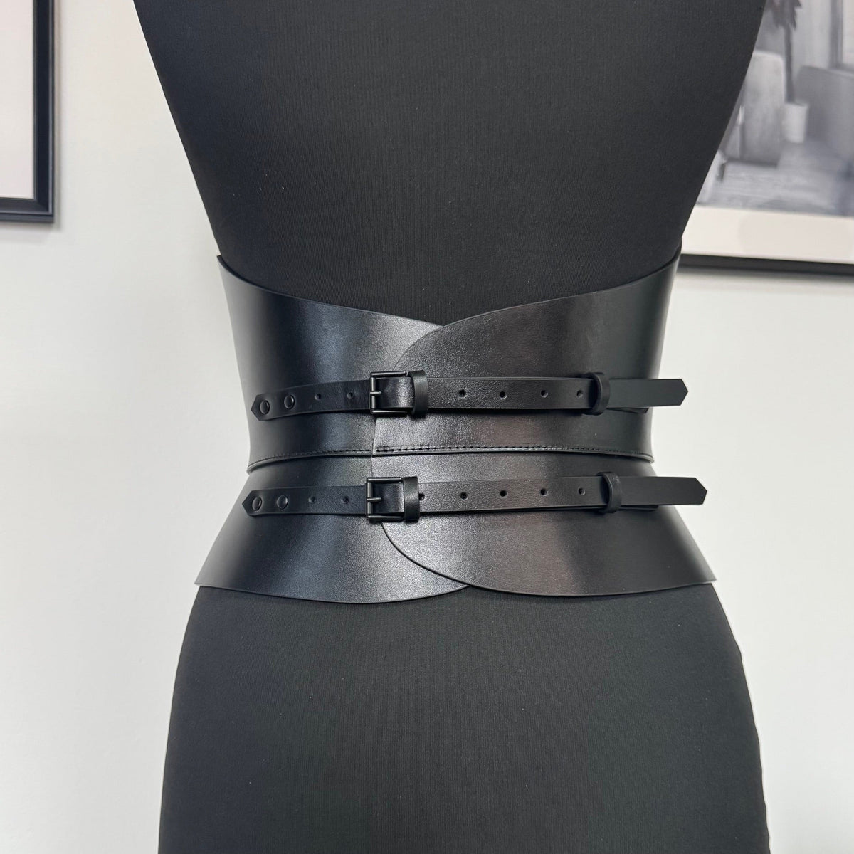 Aria Margo black Italian leather corset belt with two adjustable back buckles on a mannequin torso