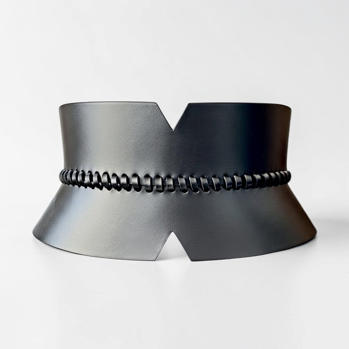 Aria Margo black leather corset belt with a V-cut design and central leather-laced seam detail.