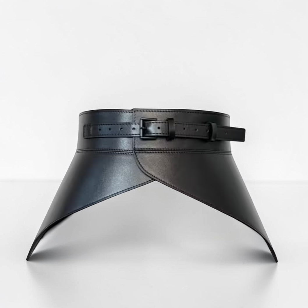 Aria Margo black Italian leather peplum corset belt with a structured waist-cinching design and buckle closure.