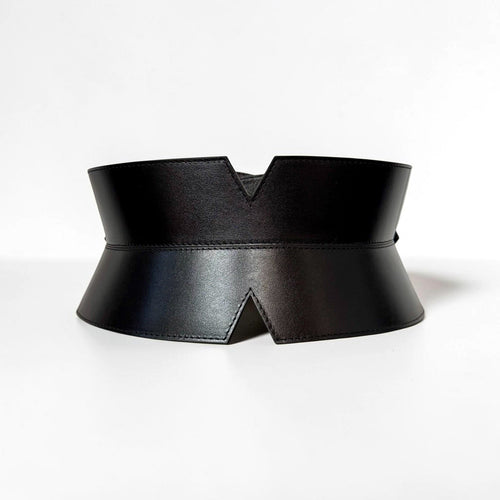 Aria Margo black leather corset belt with a V-cut front, featuring precise stitching and a minimalist design.