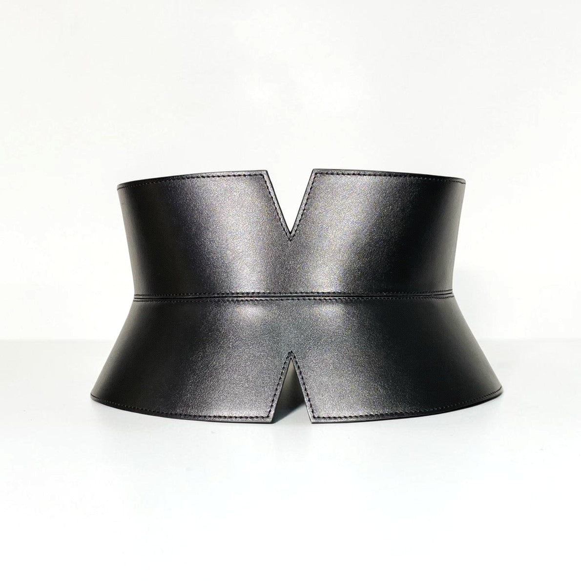Aria Margo black Italian leather V-cut corset belt with an hourglass silhouette and stitched edge detailing.