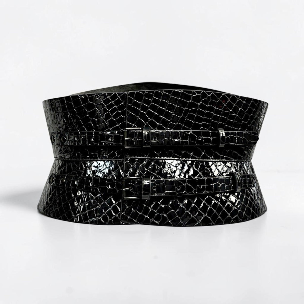 Aria Margo black patent croc-embossed leather corset belt with an hourglass silhouette and two front buckles.