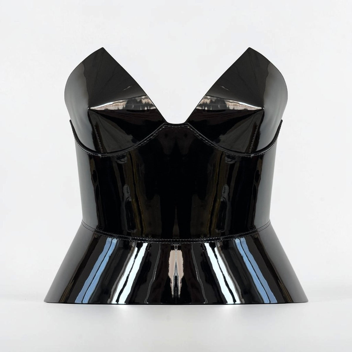 Aria Margo black patent leather corset belt with a high-shine finish and structured, feminine silhouette.