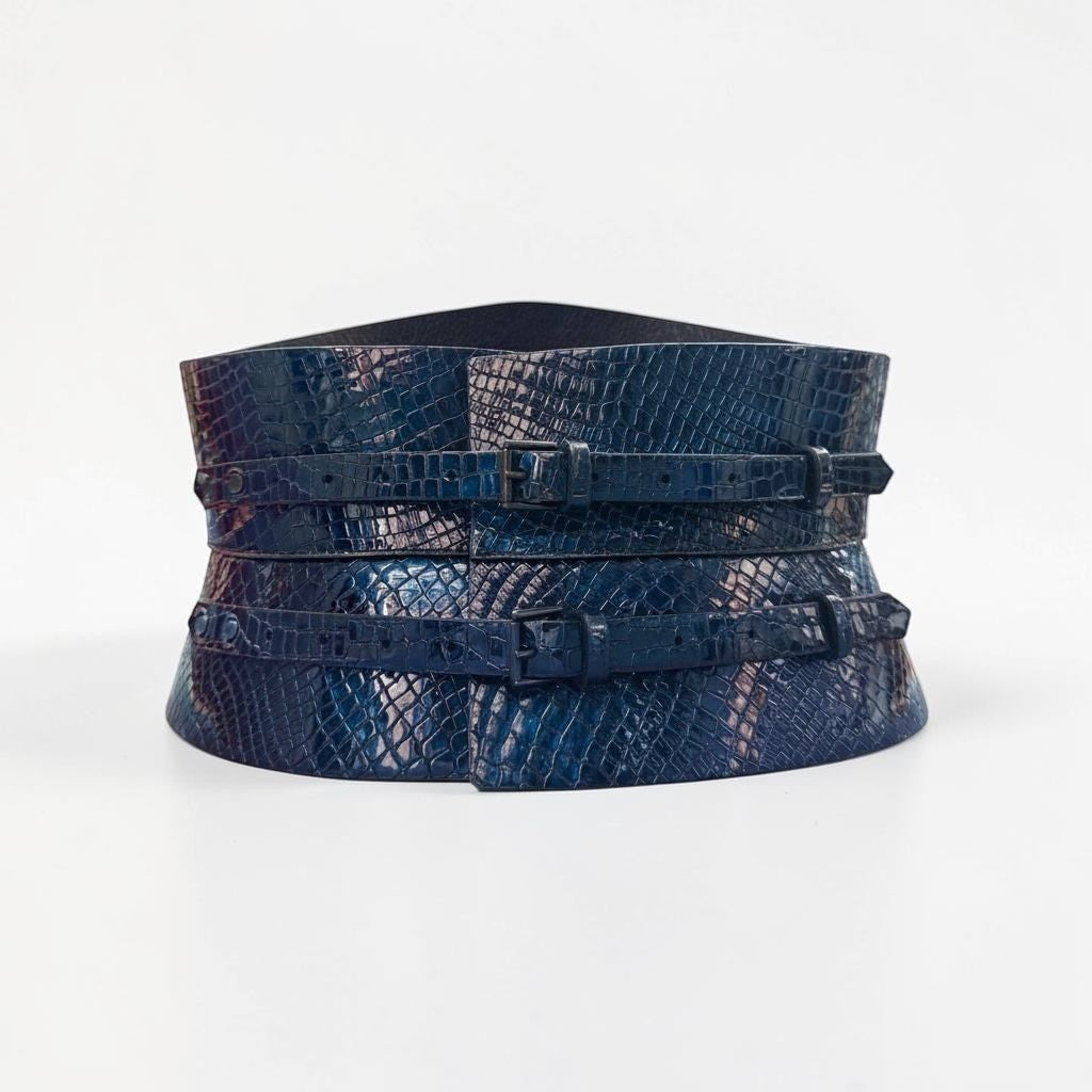 Aria Margo blue croc-embossed leather corset belt with two black buckles and an hourglass silhouette.