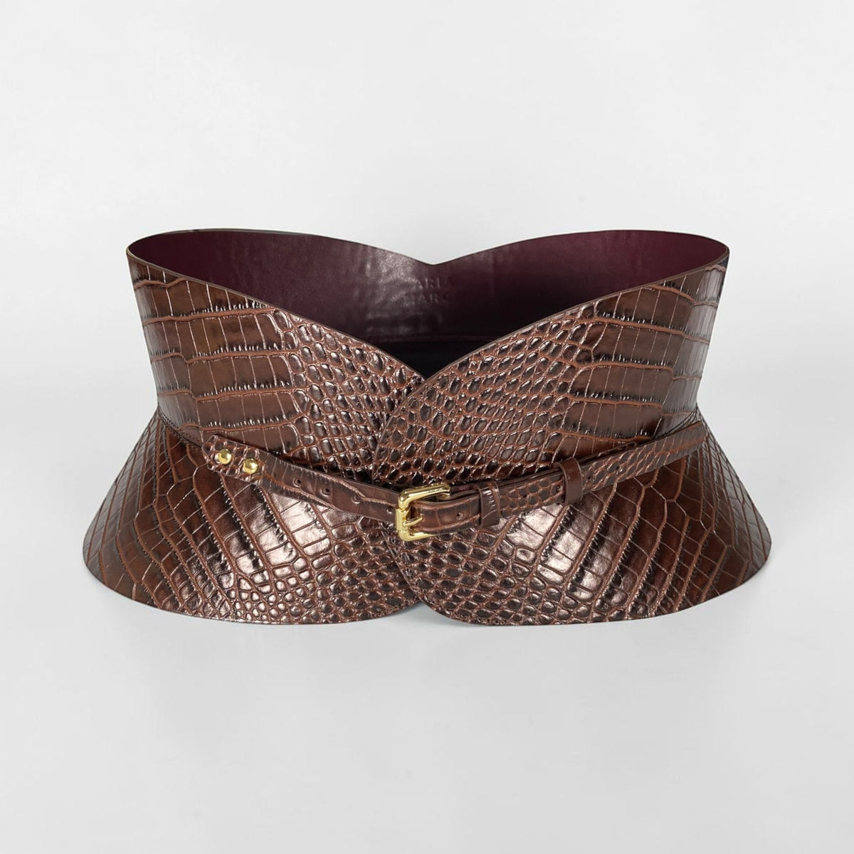 Aria Margo brown croc-embossed leather hourglass corset belt with a slim gold buckle and structured silhouette.