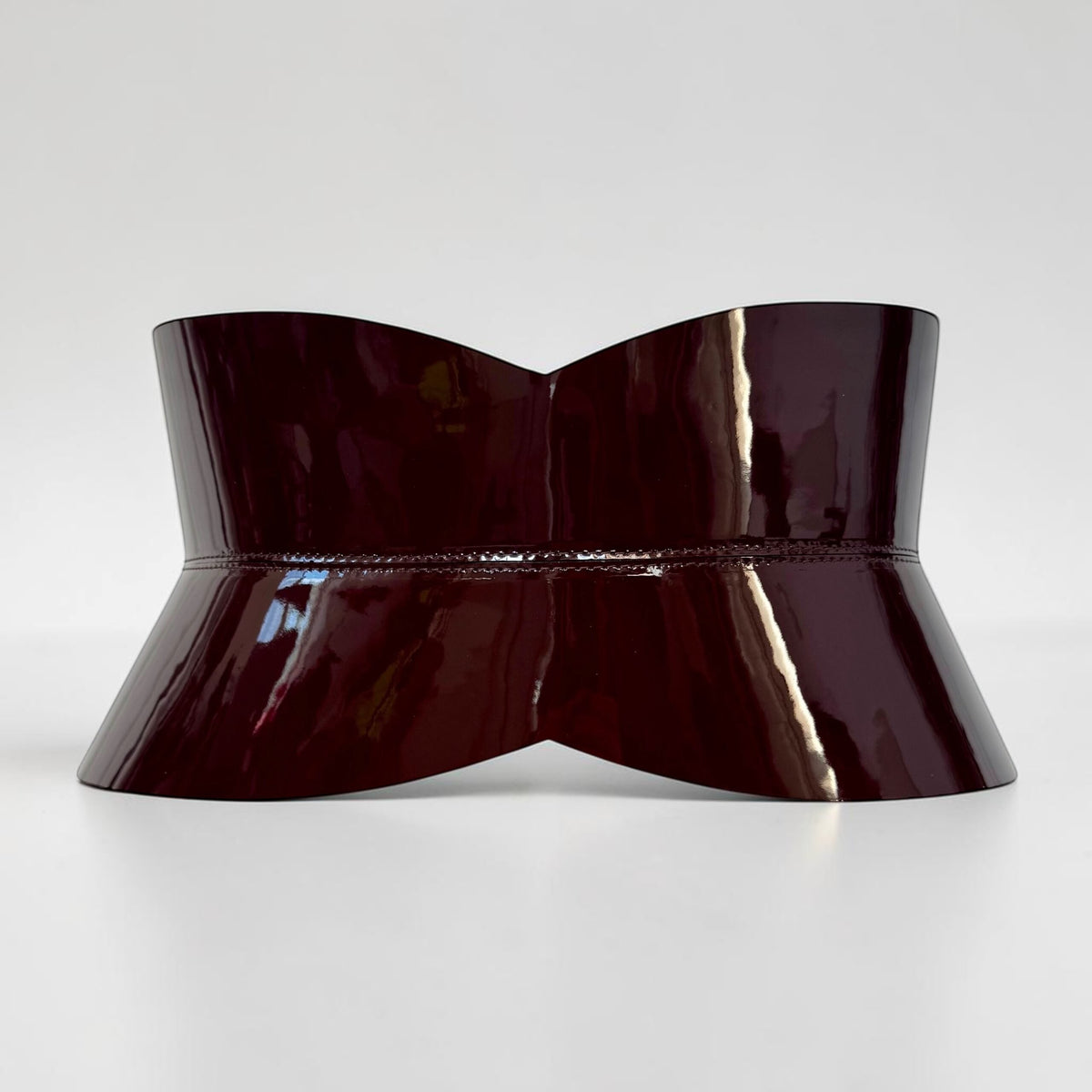 Aria Margo chocolate brown patent leather hourglass corset belt with a high-shine finish.