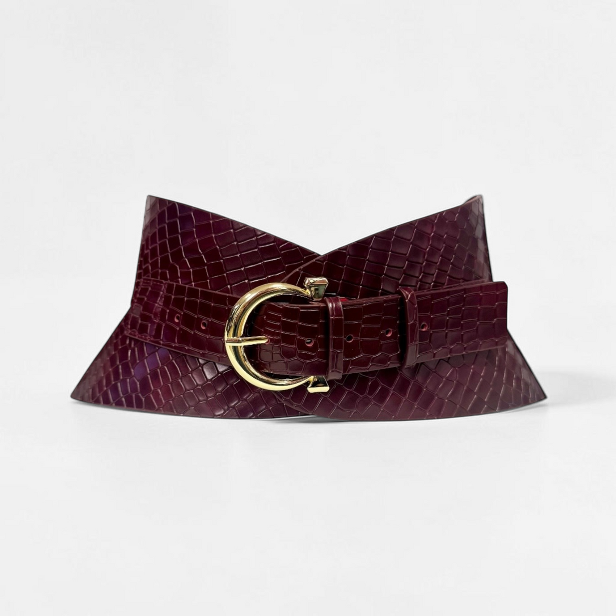 Aria Margo burgundy croc-embossed leather corset belt with a gold-tone buckle and curved hourglass silhouette.
