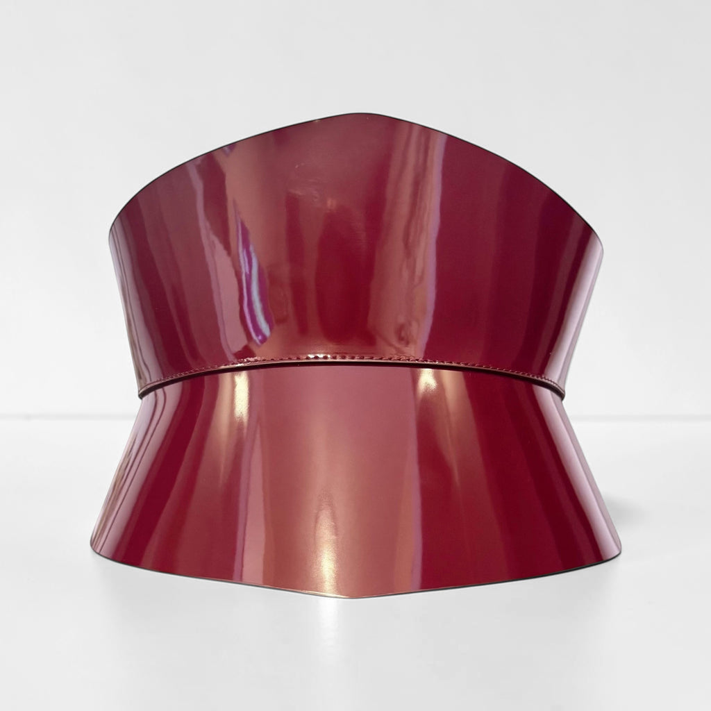 Aria Margo burgundy Italian leather corset belt with an hourglass silhouette and glossy finish.