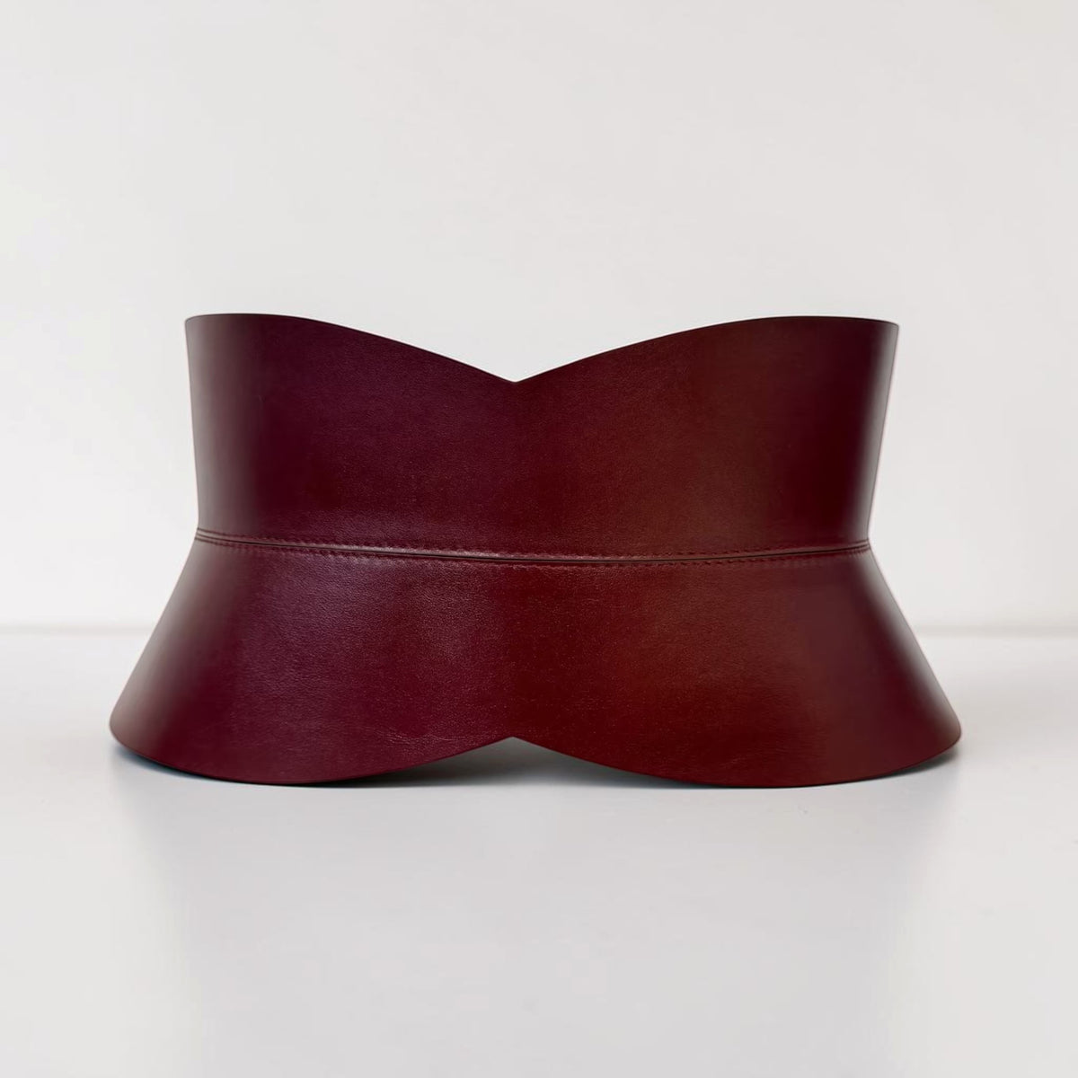 Aria Margo burgundy Italian leather hourglass corset belt with a structured waist-defining silhouette.
