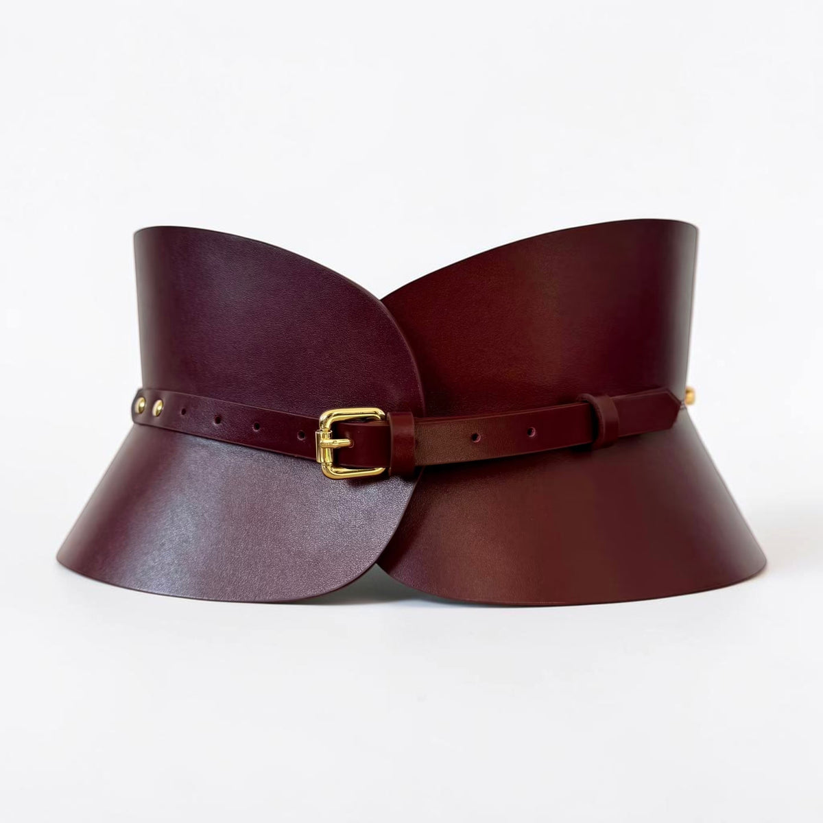 Aria Margo burgundy Italian leather hourglass corset belt with a gold buckle and structured waist design.