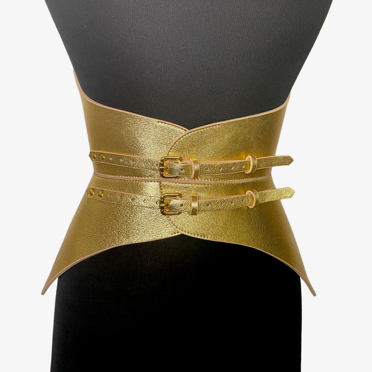 Aria Margo gold Italian leather corset belt with metallic finish and two back buckles on a mannequin torso