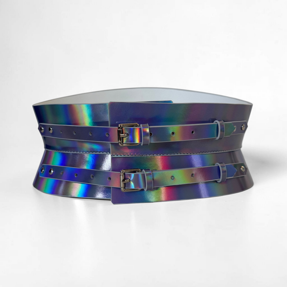 Aria Margo holographic silver leather corset belt with two silver-tone buckles and a curved, mini profile.
