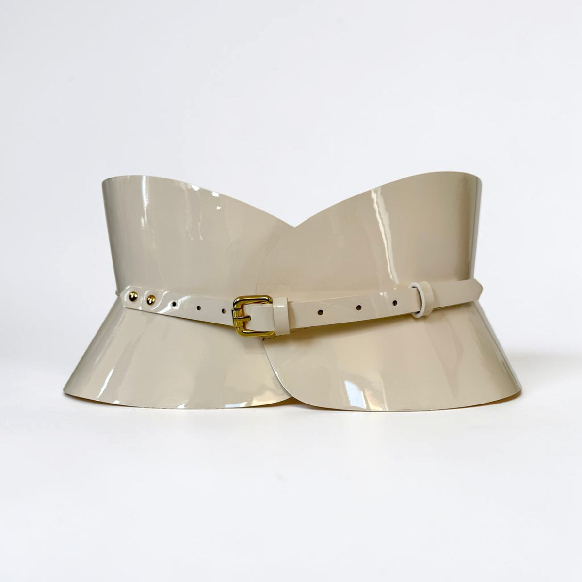 Aria Margo ivory patent leather hourglass corset belt with a high-shine finish and a slim gold-tone buckle.