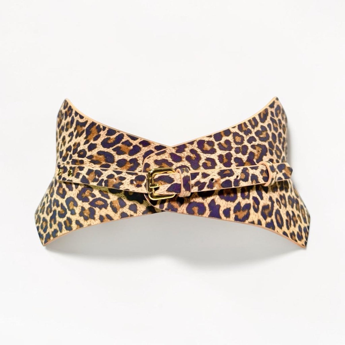 Aria Margo Thorns corset belt in leopard print leather with a gold buckle and pointed waist design.