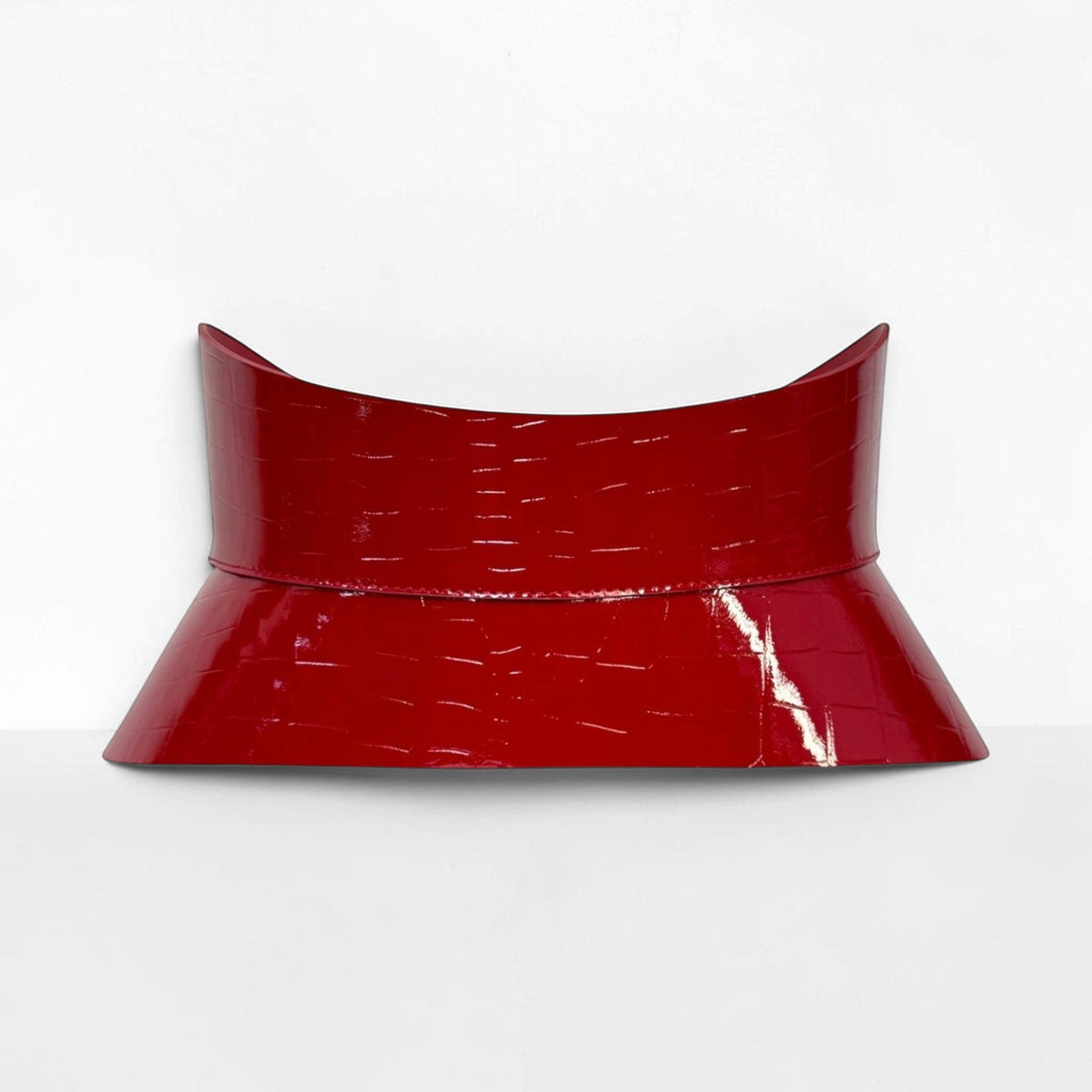 Aria Margo red croc-embossed leather corset belt with an hourglass silhouette and textured finish.