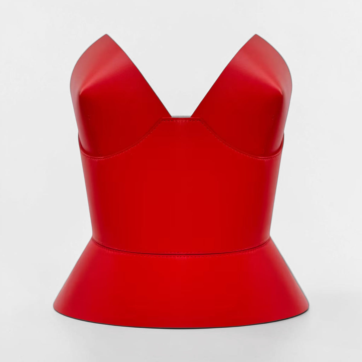 Aria Margo  red Italian leather corset belt with a structured round body design for a feminine silhouette.
