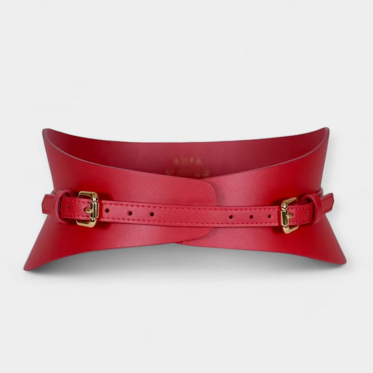 Aria Margo slim red Italian leather corset belt with gold buckles and a structured waist-defining design.