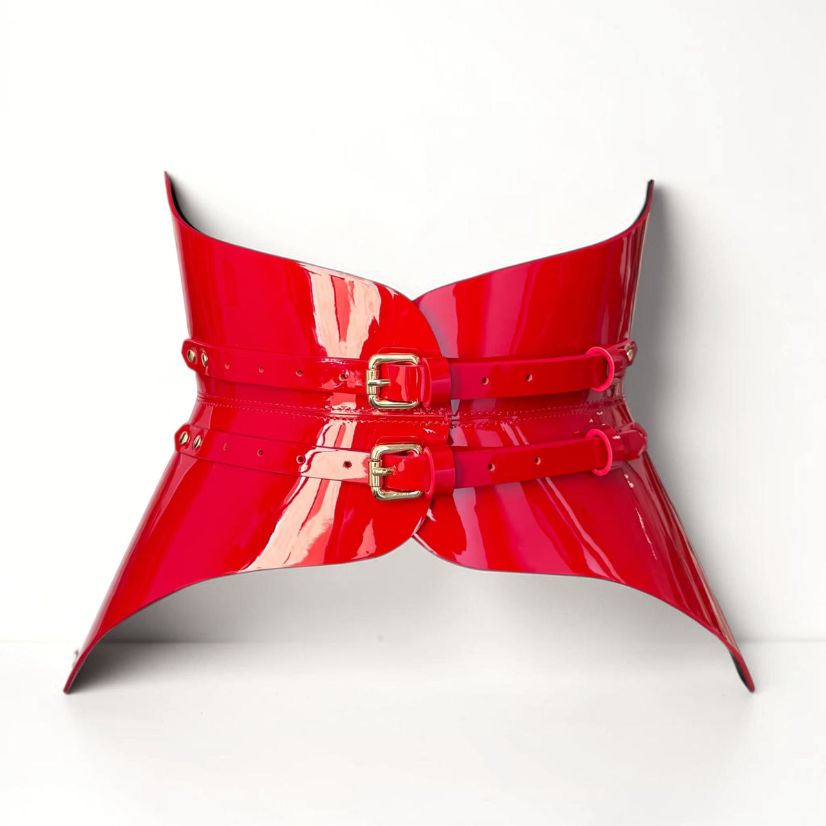 Aria Margo red patent leather corset belt with a high-shine finish and two back buckle straps.
