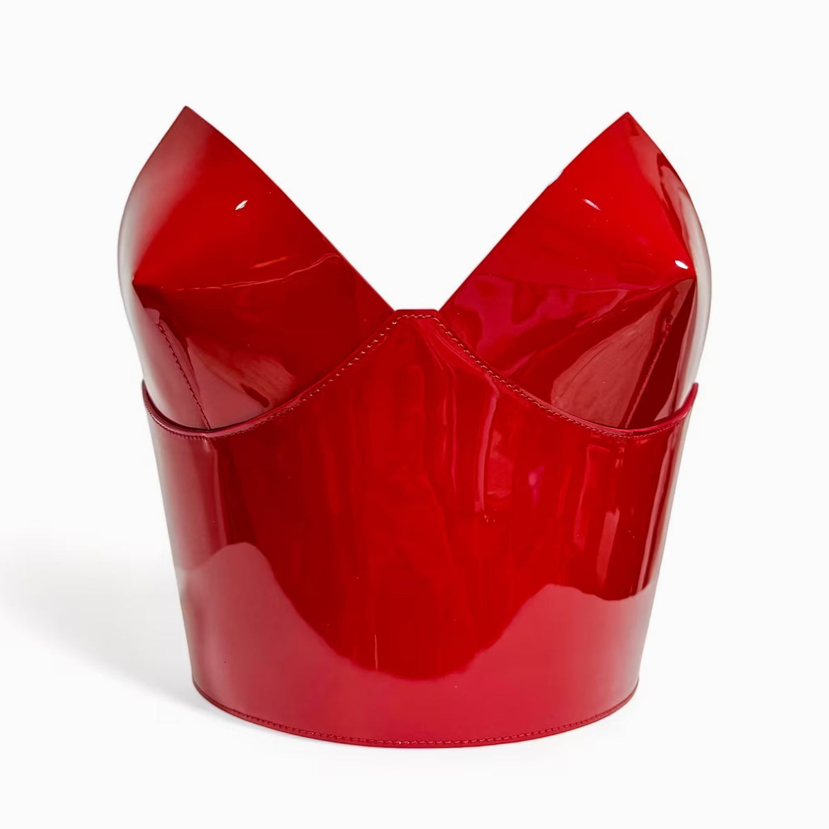 Aria Margo red patent leather over-bust corset with a high-shine finish and structured architectural silhouette.