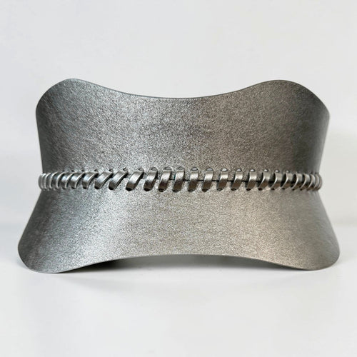 Aria Margo silver leather corset belt featuring hand-laced detailing and a metallic finish for a polished look.