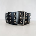 Aria Margo Test black leather coat belt featuring three rows of silver eyelets and a double-prong buckle.