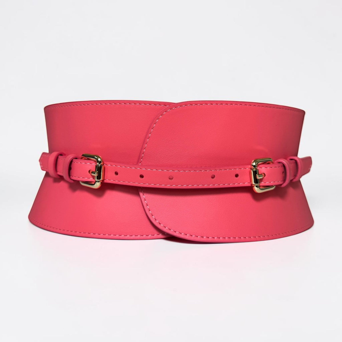 Aria Margo Test coral pink Italian leather corset belt with gold buckles and adjustable strap design.