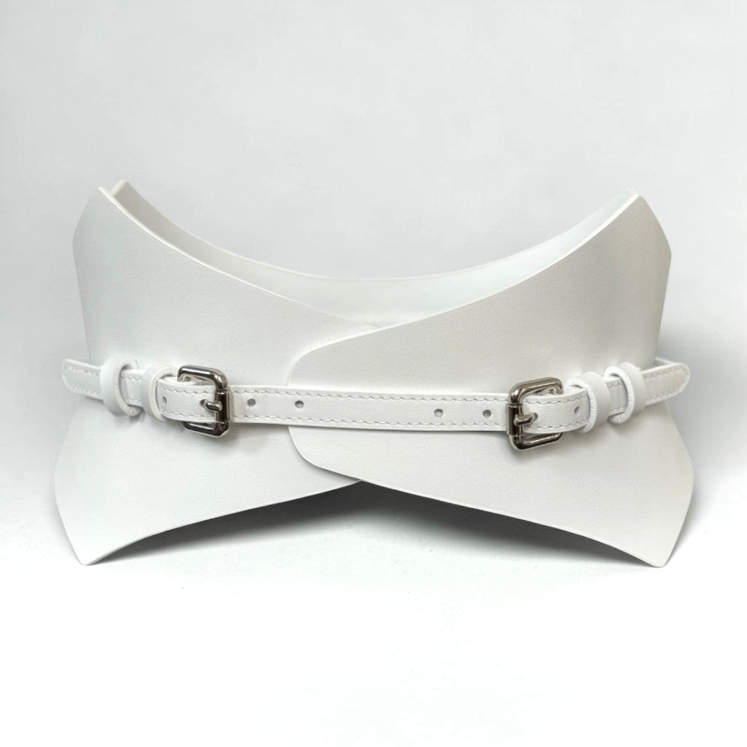 Aria Margo Test white Italian leather corset belt with a pointed silhouette and two silver buckles.