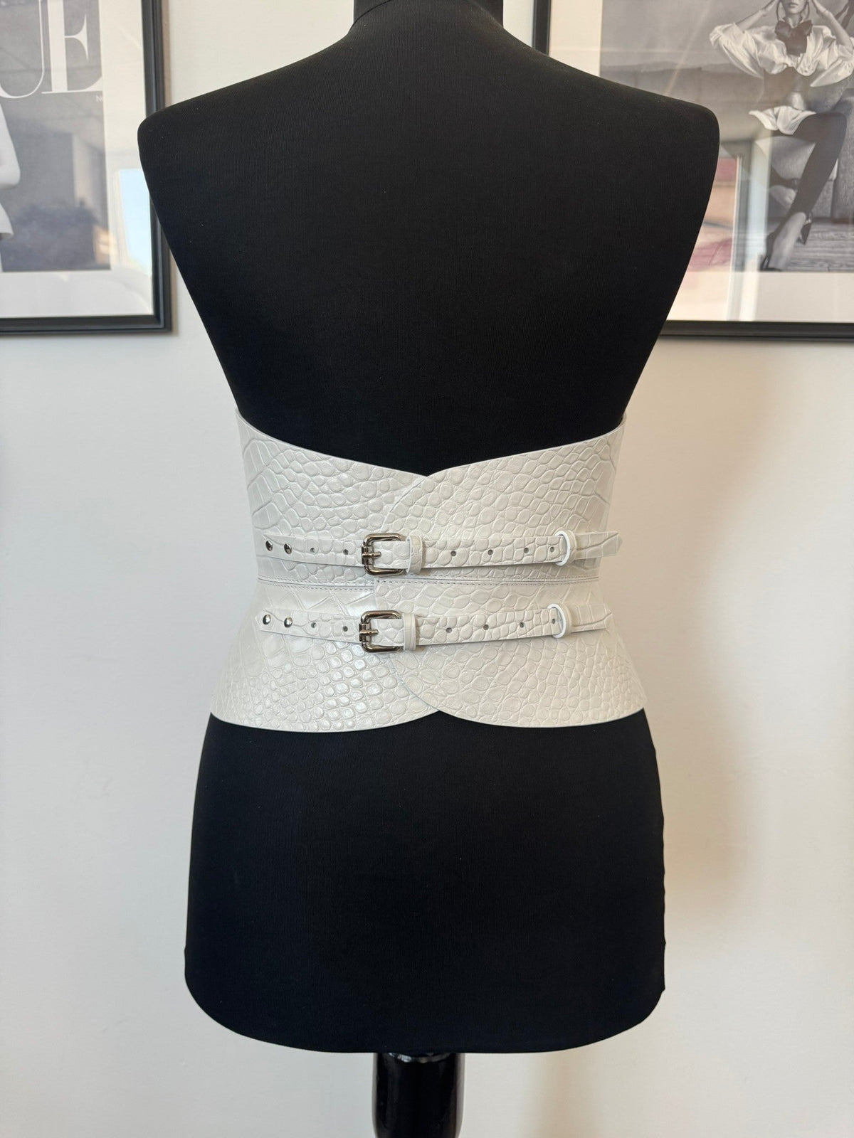 Aria Margo white croco leather corset belt with double buckle straps on a black mannequin torso
