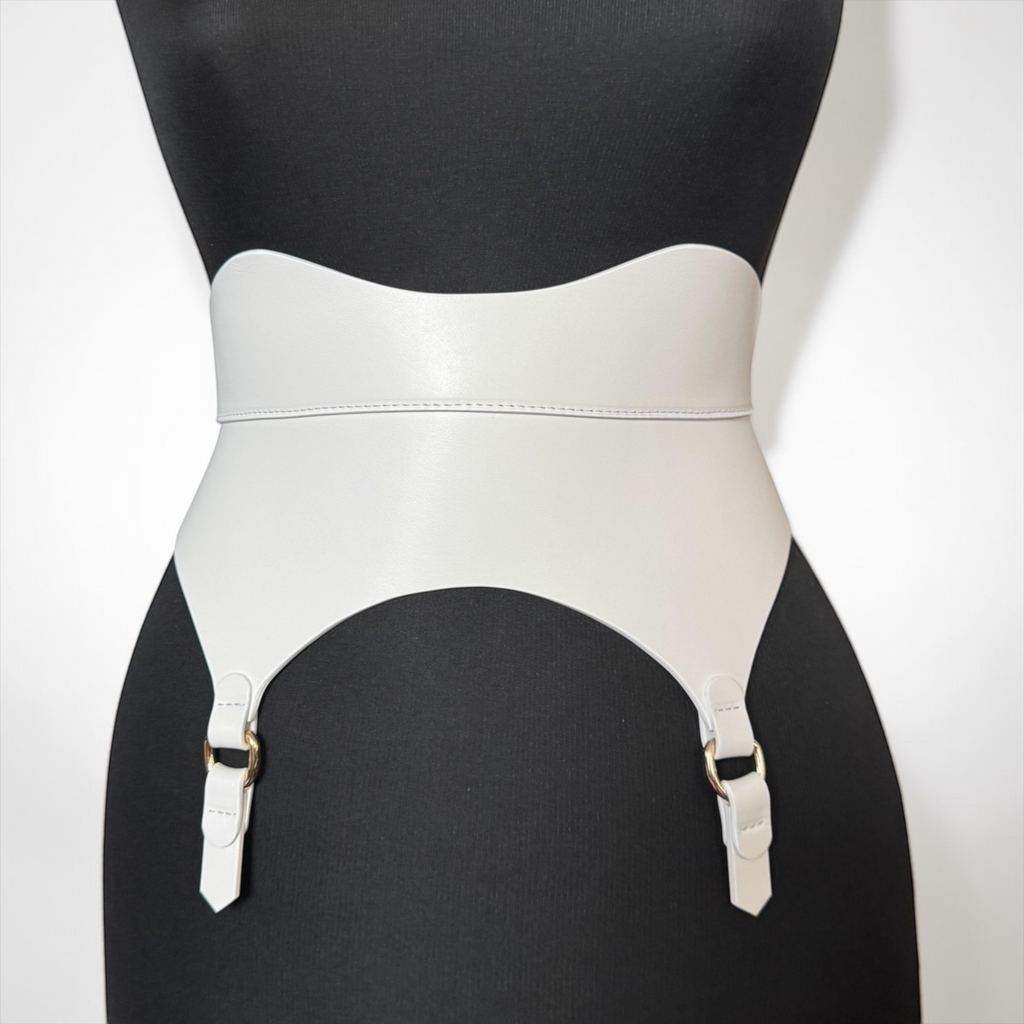 Aria Margo white genuine Italian leather corset belt with gold-tone buckles and garter straps on a mannequin.