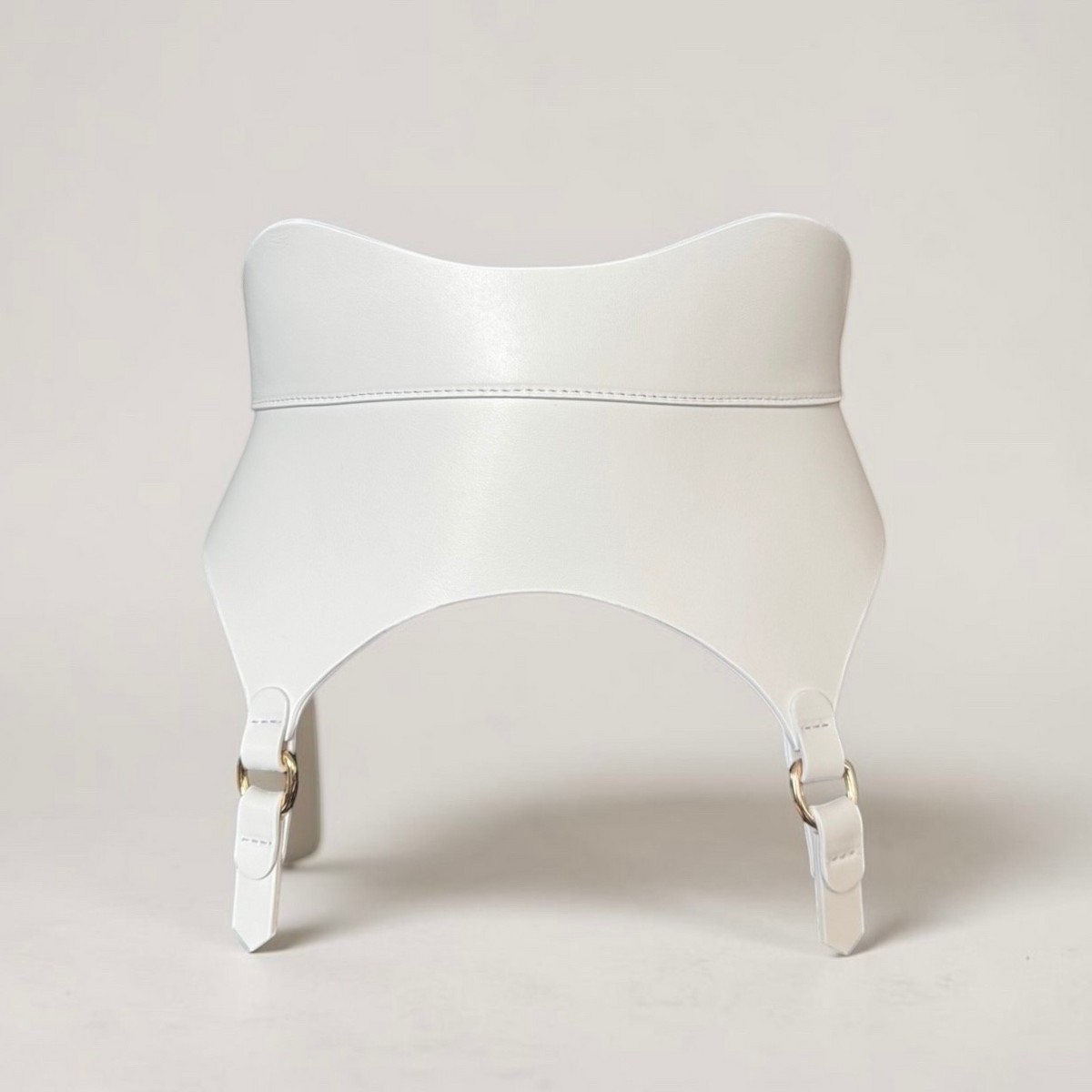 Aria Margo white genuine Italian leather corset belt with gold-tone buckles and attached garter straps.