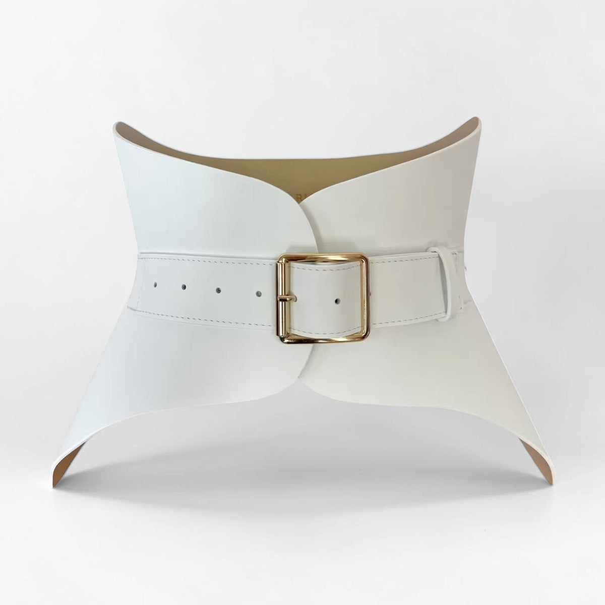 Aria Margo white leather corset belt with a gold buckle, designed to shape the waist and hips.