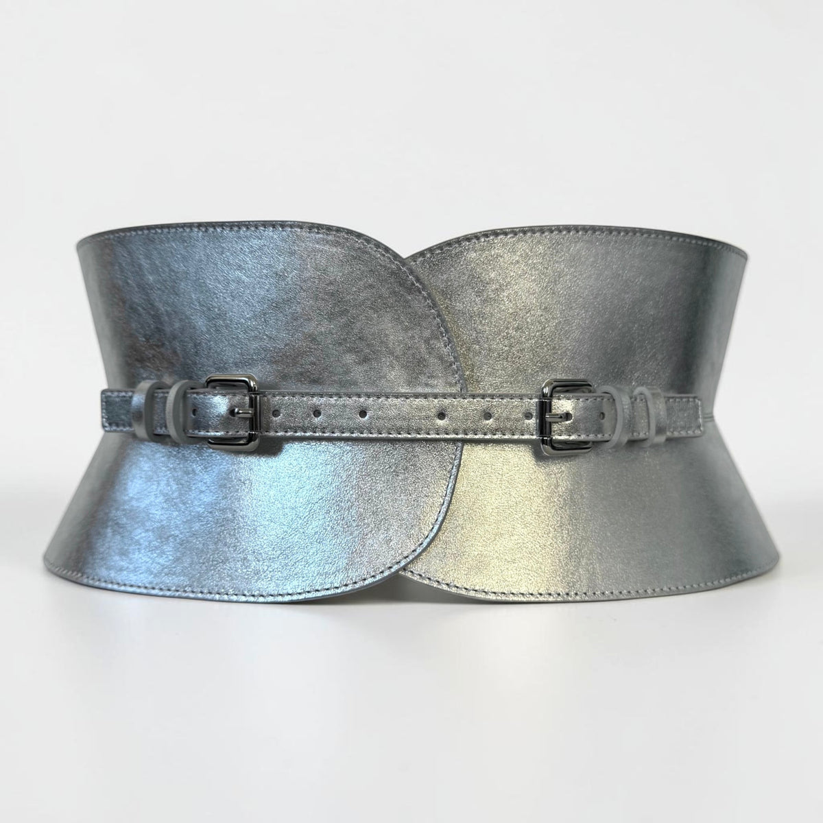 Aria Margo wide silver metallic leather corset belt with an hourglass silhouette and two adjustable buckles.